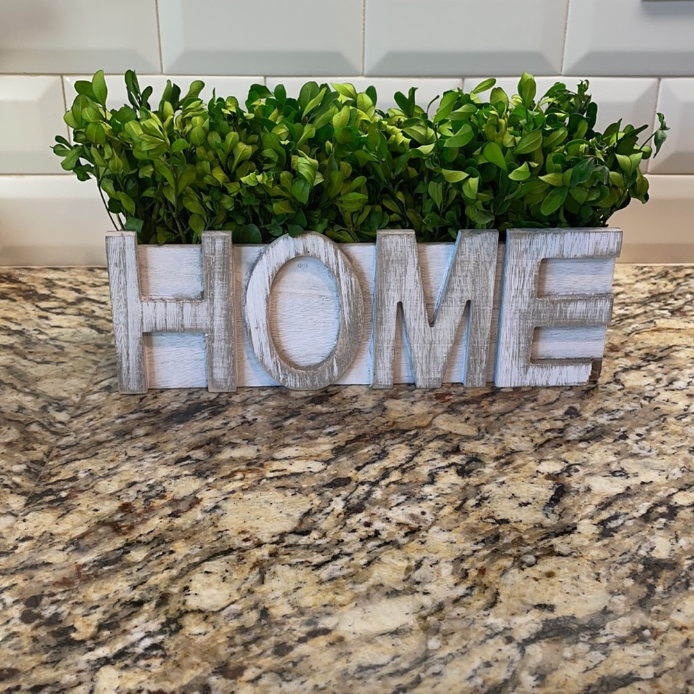 Rustic HOME planter with faux greenery.